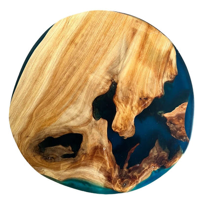 Handcrafted Round Epoxy Resin Art Piece with Natural Wood Patterns and Rich Blue Resin