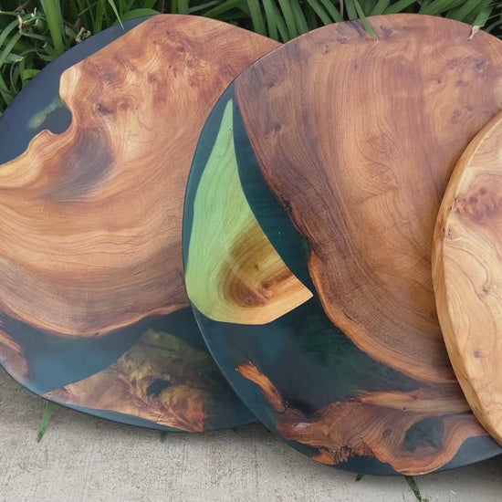 Video of Cedar Wood and Epoxy Resin Art Pieces Displayed Against Grass Background